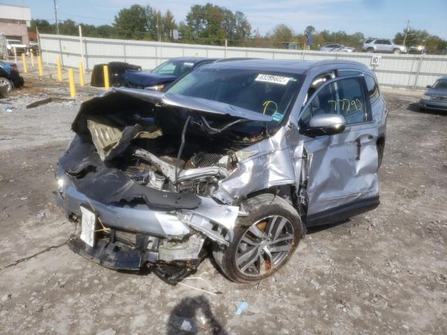 Photo 2 from auction – 2017 HONDA PILOT TOUR with VIN 5FNYF5H95HB024079