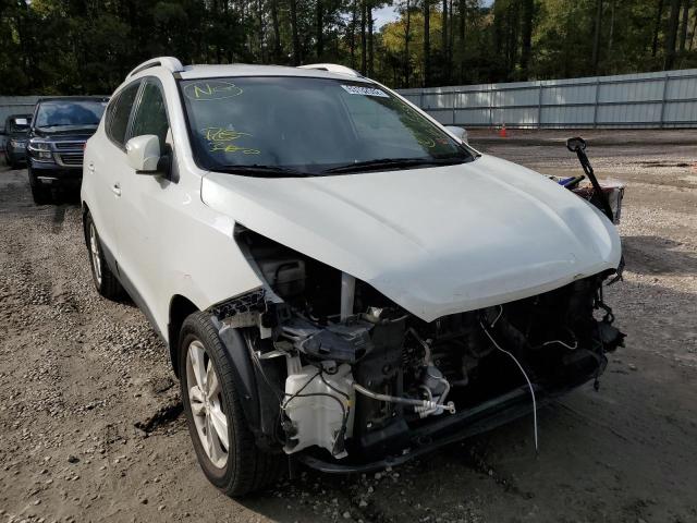 Photo 1 from auction – 2012 HYUNDAI TUCSON GLS with VIN KM8JUCAC6CU371353
