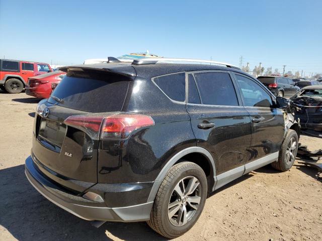 Photo 4 from auction – 2016 TOYOTA RAV4 XLE with VIN 2T3WFREV8GW247290
