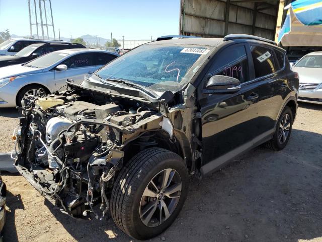 Photo 2 from auction – 2016 TOYOTA RAV4 XLE with VIN 2T3WFREV8GW247290