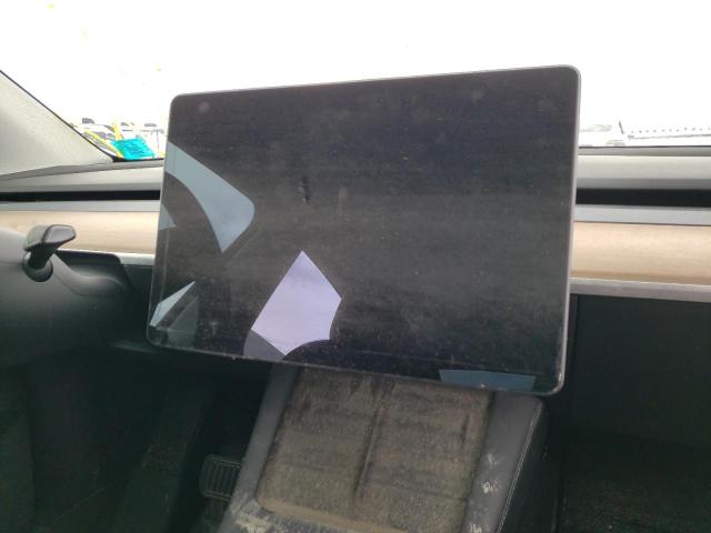 Photo 8 from auction – 2021 TESLA MODEL Y with VIN 5YJYGDEE4MF174333