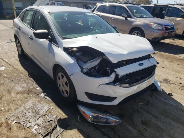FORD FOCUS S 2015 with VIN 1FADP3E2XFL318035 - Photo from auction