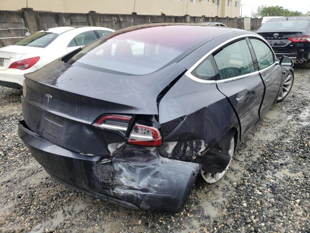 Photo 4 from auction – 2018 TESLA MODEL 3 with VIN 5YJ3E1EA5JF012069