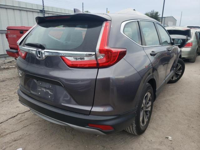 Photo 4 from auction – 2017 HONDA CR-V LX with VIN 7FARW5H32HE001332