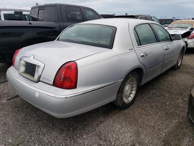 Photo 4 from auction – 2002 LINCOLN TOWN CAR E with VIN 1LNHM81W22Y666236
