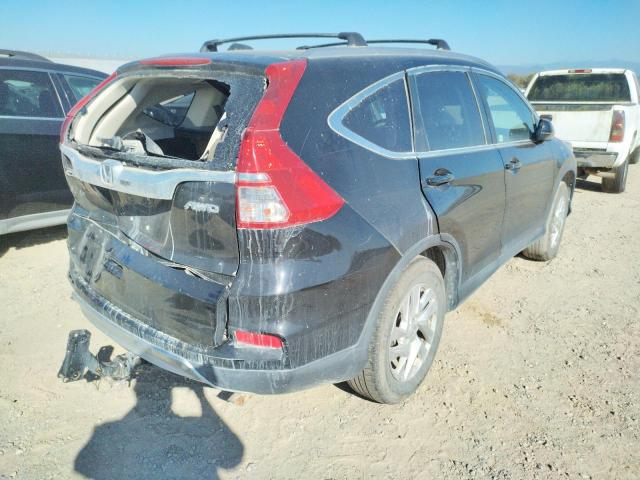 Photo 4 from auction – 2015 HONDA CR-V EXL with VIN 2HKRM4H73FH682632