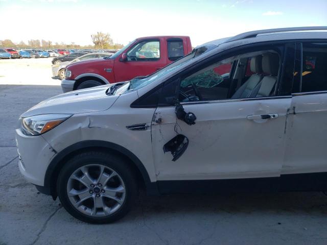 Photo 9 from auction – 2014 FORD ESCAPE TIT with VIN 1FMCU0JX5EUB22930