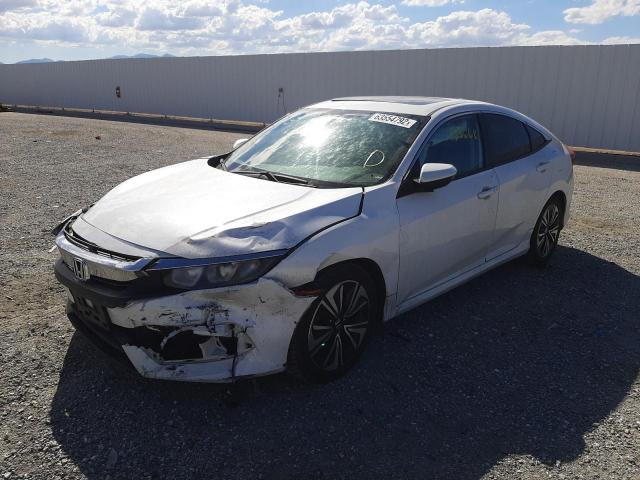 Photo 2 from auction – 2016 HONDA CIVIC EX with VIN 2HGFC1F33GH653129