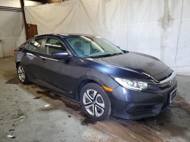 HONDA CIVIC LX 2018 with VIN 2HGFC2F59JH520227 - Photo from auction