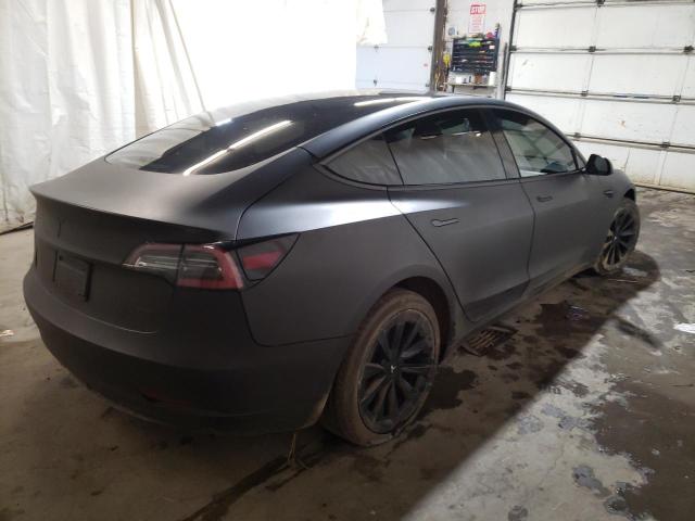 Photo 4 from auction – 2022 TESLA MODEL 3 with VIN 5YJ3E1EB4NF130032
