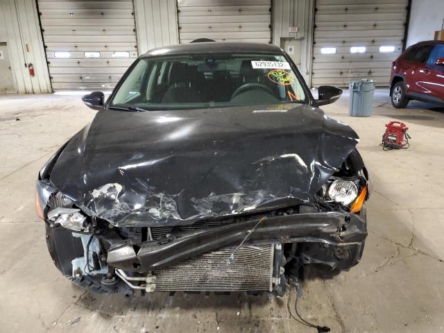 Photo 9 from auction – 2012 VOLKSWAGEN PASSAT S with VIN 1VWAP7A30CC072379