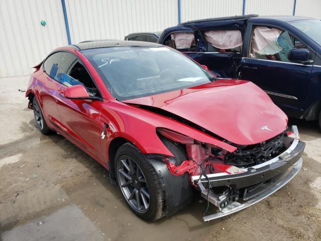 TESLA MODEL 3 2022 with VIN 5YJ3E1EBXNF247730 - Photo from auction