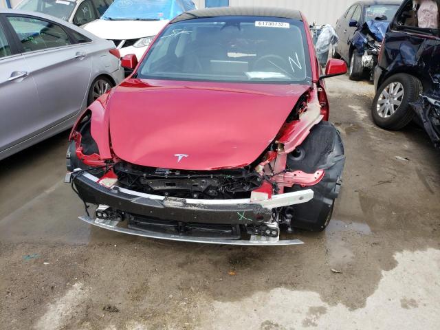 Photo 9 from auction – 2022 TESLA MODEL 3 with VIN 5YJ3E1EBXNF247730