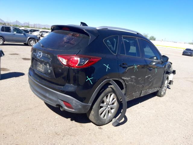 Photo 4 from auction – 2015 MAZDA CX-5 SPORT with VIN JM3KE2BE1F0477891