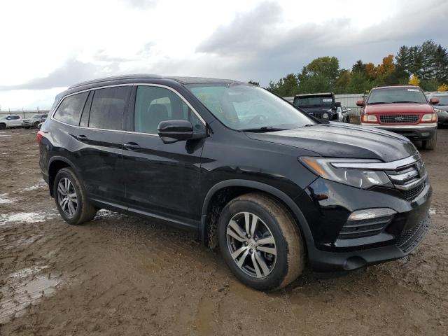 HONDA PILOT EXL 2016 with VIN 5FNYF6H5XGB018912 - Photo from auction