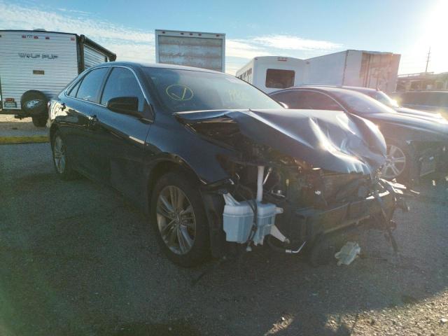TOYOTA CAMRY LE 2017 with VIN 4T1BF1FK6HU318033 - Photo from auction