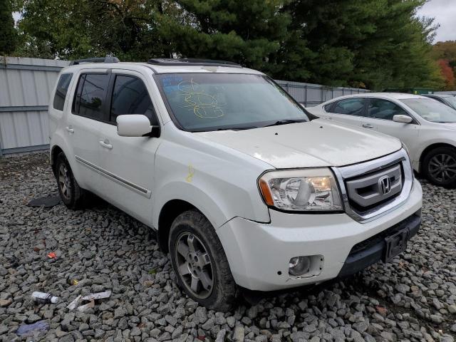 HONDA PILOT TOUR 2011 with VIN 5FNYF3H97BB047522 - Photo from auction