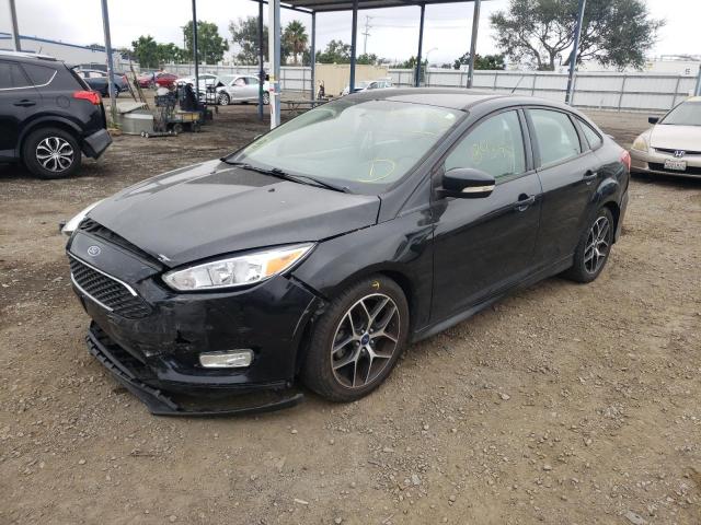 Photo 2 from auction – 2015 FORD FOCUS SE with VIN 1FADP3F24FL221637