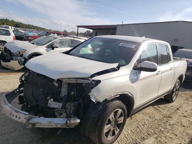 Photo 2 from auction – 2017 HONDA RIDGELINE with VIN 5FPYK3F54HB021973