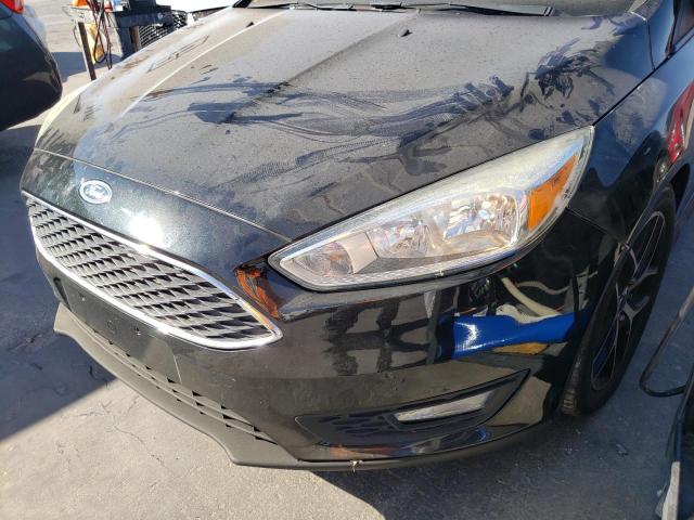 Photo 9 from auction – 2015 FORD FOCUS SE with VIN 1FADP3FE9FL347583