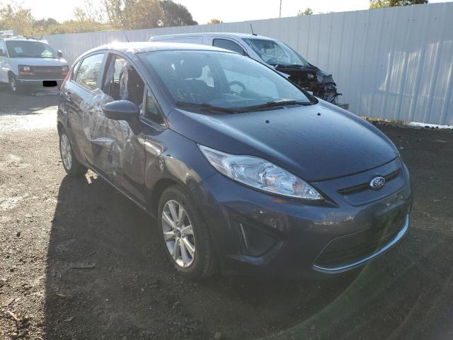 FORD FIESTA SE 2012 with VIN 3FADP4EJ9CM218564 - Photo from auction