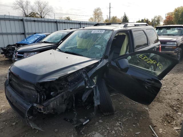 Photo 2 from auction – 2009 FORD ESCAPE LIM with VIN 1FMCU94709KB40382