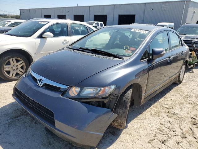 Photo 2 from auction – 2006 HONDA CIVIC HYBR with VIN JHMFA36256S024582