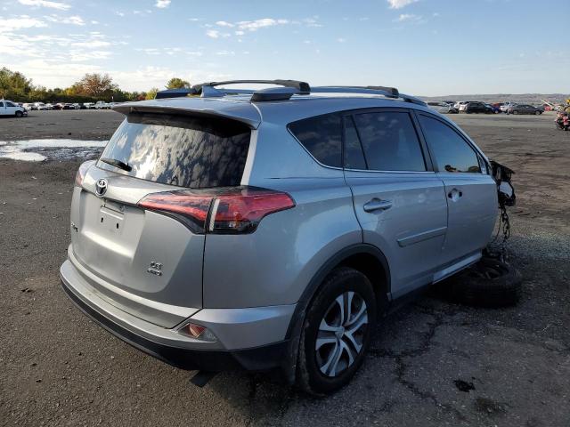 Photo 4 from auction – 2017 TOYOTA RAV4 LE with VIN 2T3BFREV3HW679026