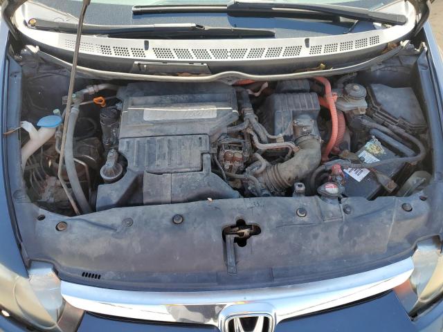Photo 7 from auction – 2006 HONDA CIVIC HYBR with VIN JHMFA36256S024582