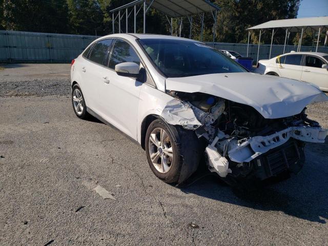 FORD FOCUS SE 2014 with VIN 1FADP3F21EL446998 - Photo from auction