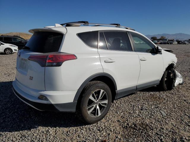 Photo 4 from auction – 2017 TOYOTA RAV4 XLE with VIN JTMRFREV0HD201027