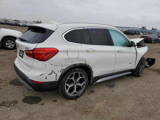 Photo 3 from auction – 2018 BMW X1 XDRIVE2 with VIN WBXHT3C31J5L25409