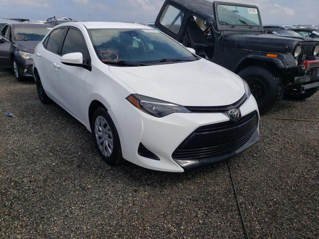 TOYOTA COROLLA L 2019 with VIN 5YFBURHEXKP870784 - Photo from auction