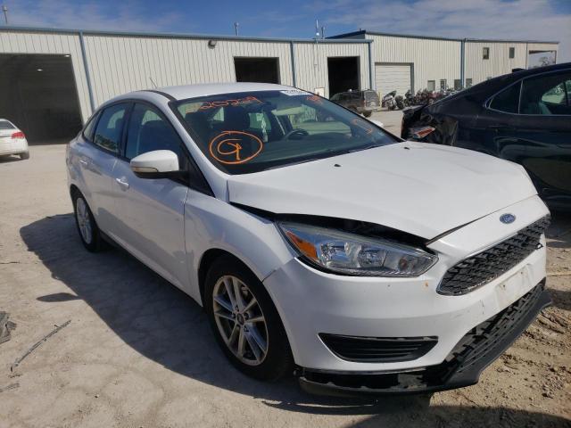 FORD FOCUS SE 2015 with VIN 1FADP3F26FL220229 - Photo from auction