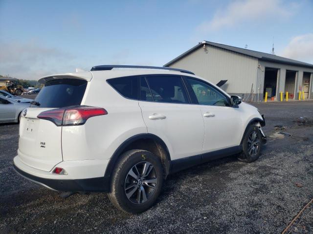 Photo 4 from auction – 2017 TOYOTA RAV4 XLE with VIN JTMRFREV9HD210096