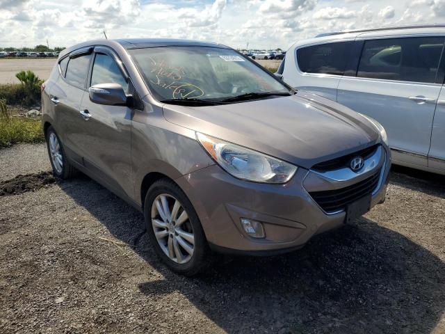 HYUNDAI TUCSON GLS 2012 with VIN KM8JUCAC1CU468296 - Photo from auction