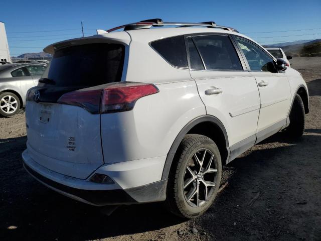 Photo 4 from auction – 2017 TOYOTA RAV4 SE with VIN JTMJFREV6HJ121245