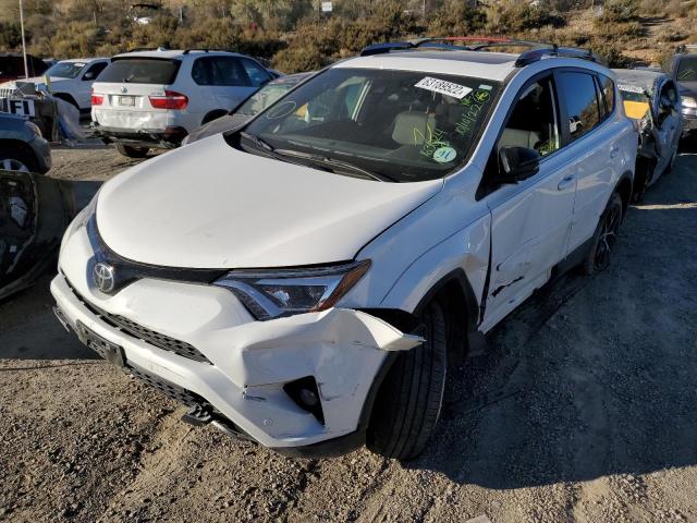 Photo 2 from auction – 2017 TOYOTA RAV4 SE with VIN JTMJFREV6HJ121245