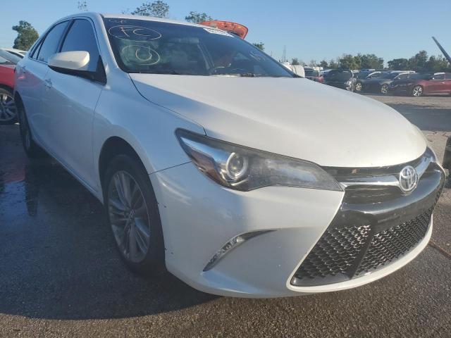 TOYOTA CAMRY LE 2017 with VIN 4T1BF1FKXHU403473 - Photo from auction