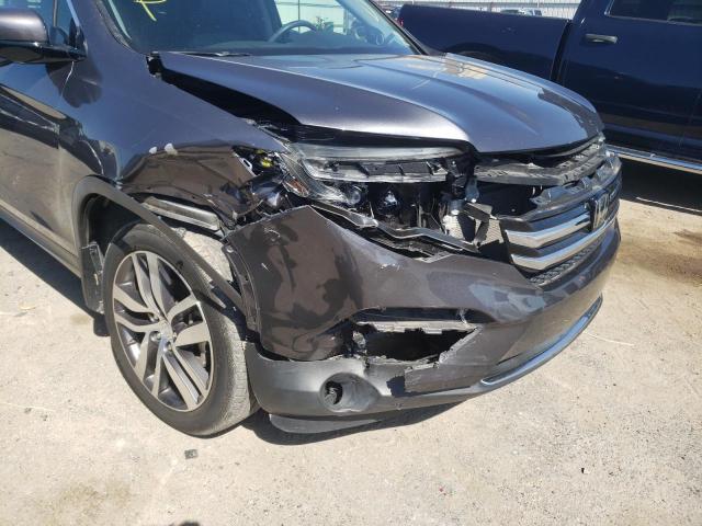 Photo 9 from auction – 2018 HONDA PILOT TOUR with VIN 5FNYF5H97JB003644