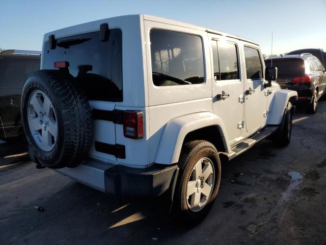 Photo 4 from auction – 2011 JEEP WRANGLER U with VIN 1J4BA5H13BL604721