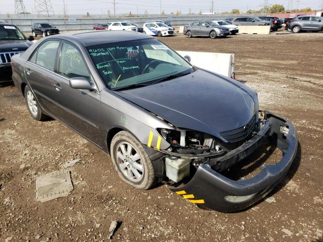 TOYOTA CAMRY LE 2003 with VIN 4T1BF30K93U548727 - Photo from auction