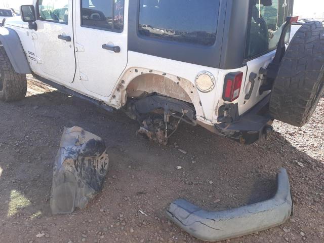 Photo 9 from auction – 2011 JEEP WRANGLER U with VIN 1J4BA3H18BL584583