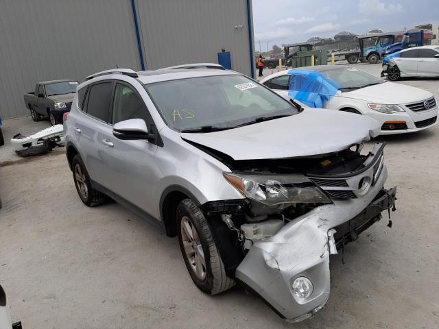 TOYOTA RAV4 XLE 2014 with VIN JTMWFREV6EJ016089 - Photo from auction