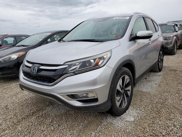 Photo 2 from auction – 2016 HONDA CR-V TOURI with VIN 5J6RM3H96GL024970