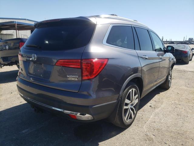 Photo 4 from auction – 2018 HONDA PILOT TOUR with VIN 5FNYF5H97JB003644