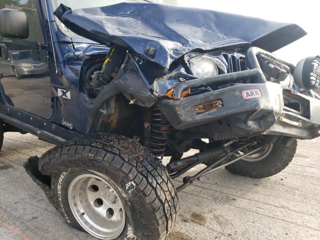 Photo 9 from auction – 2004 JEEP WRANGLER X with VIN 1J4FA39S84P768765