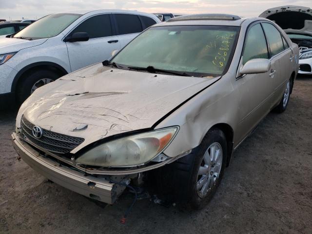 Photo 2 from auction – 2002 TOYOTA CAMRY LE with VIN JTDBF32K920015980