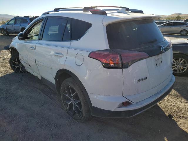 Photo 3 from auction – 2017 TOYOTA RAV4 SE with VIN JTMJFREV6HJ121245