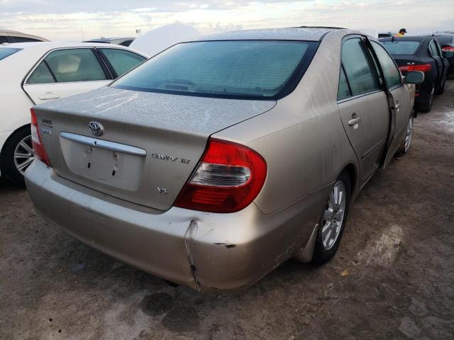 Photo 4 from auction – 2002 TOYOTA CAMRY LE with VIN JTDBF32K920015980